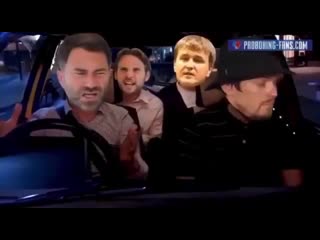 usyk tries to drive away from david haye and derrick chisora