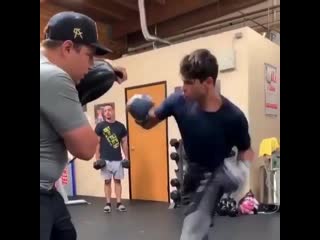 ryan garcia training to hammer nails with his left hand