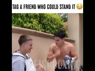 ryan garcia checks friend's abs