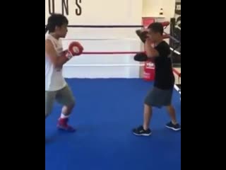 manny pacquiao's oldest son works on his paws