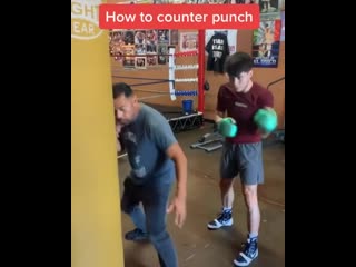 practicing counter punches from slopes on a heavy bag