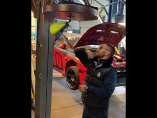 lomachenko got hit by boxing fans in a car repair shop