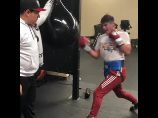 practicing a reciprocal power attack by ryan garcia on a bag