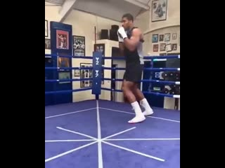 anthony joshua practicing shadow boxing with boxing rubber