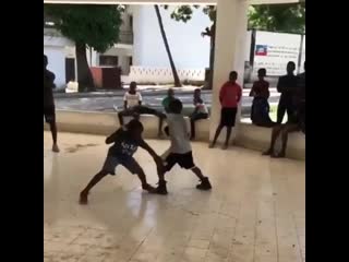 young boxers sparring in haiti