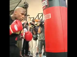 old floyd mayweather is back in training. working on a heavy bag