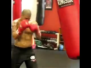 miguel cotto training on a heavy bag