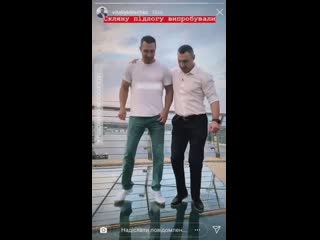 kyiv mayor vitali klitschko and his brother volodymyr tested the strength of a glass bridge