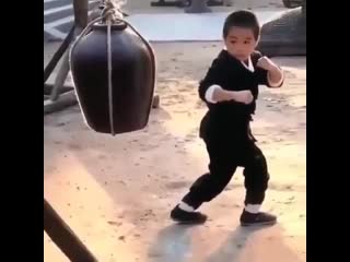 little bruce lee shows off his skills