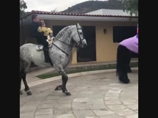 canelo alvarez rides his little princess on a horse