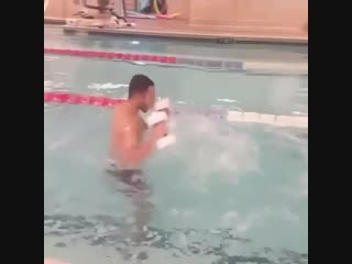 boxing training for punching power with dumbbells in the pool