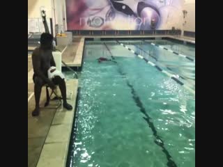 adrien broner is working on his endurance in the pool by holding his breath.