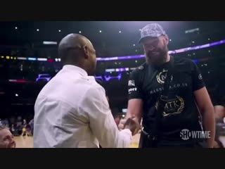 tyson fury and floyd mayweather met at an nba game in los angeles.