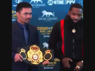 when manny pacquiao and adrien broner showed off their championship belts, which they will defend