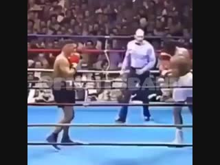 effective defense in boxing with a pendulum performed by mike tyson.