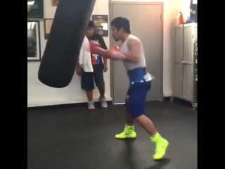 manny pacquiao's speed work on a heavy bag.