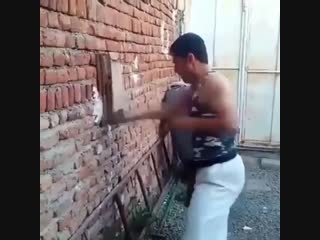 stuffing fists on the wall at home.