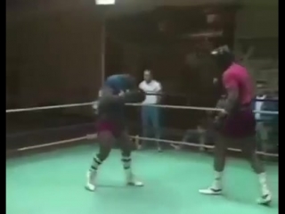 mike tyson's offensive peek-a-boo style.