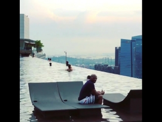 floyd mayweather relaxes in the pool at the top of the world in singapore.