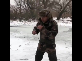 when vasily lomachenko froze on the hunt and is waiting for a wild boar.