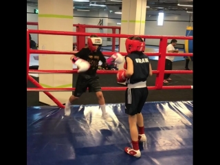 promising ukrainian kira makogonenko teaches boys boxing.