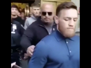 conor mcgregor leaves the police station.