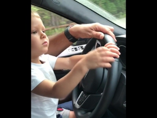 little crusher learns to drive a car.